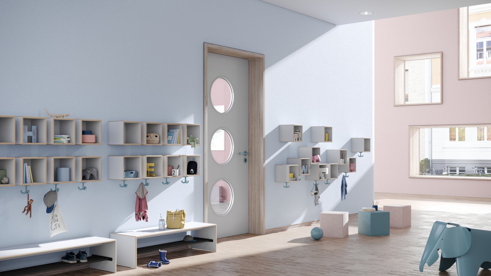 Blue-coloured kindergarten hallway with wall-mounted coat racks, triple hooks and seating